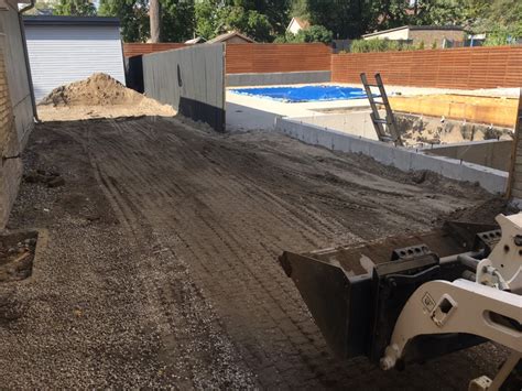 easier to break up driveway with excavator or skid steer|diy driveway demolition.